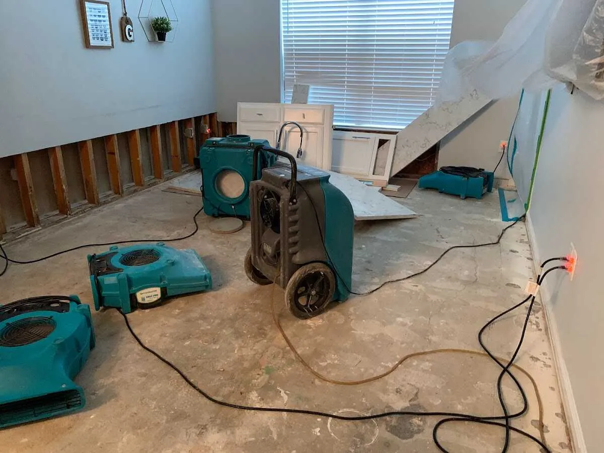 Dehumidifier in flood-cut room for Water Damage Restoration in Florence-Graham